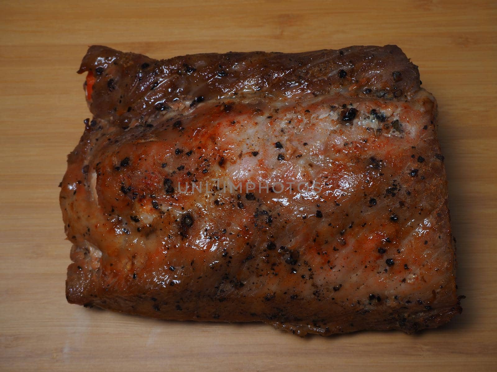 Food. Meat baked in the oven with vegetables. Close-up.