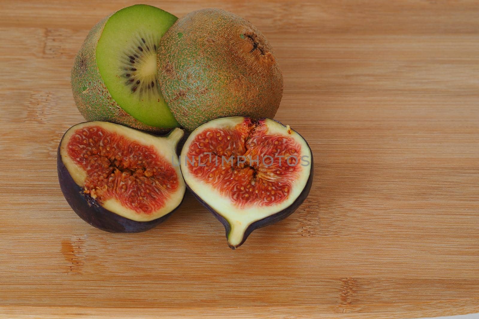 Exotic fruit. Fig and kiwi. Close-up by Olga26