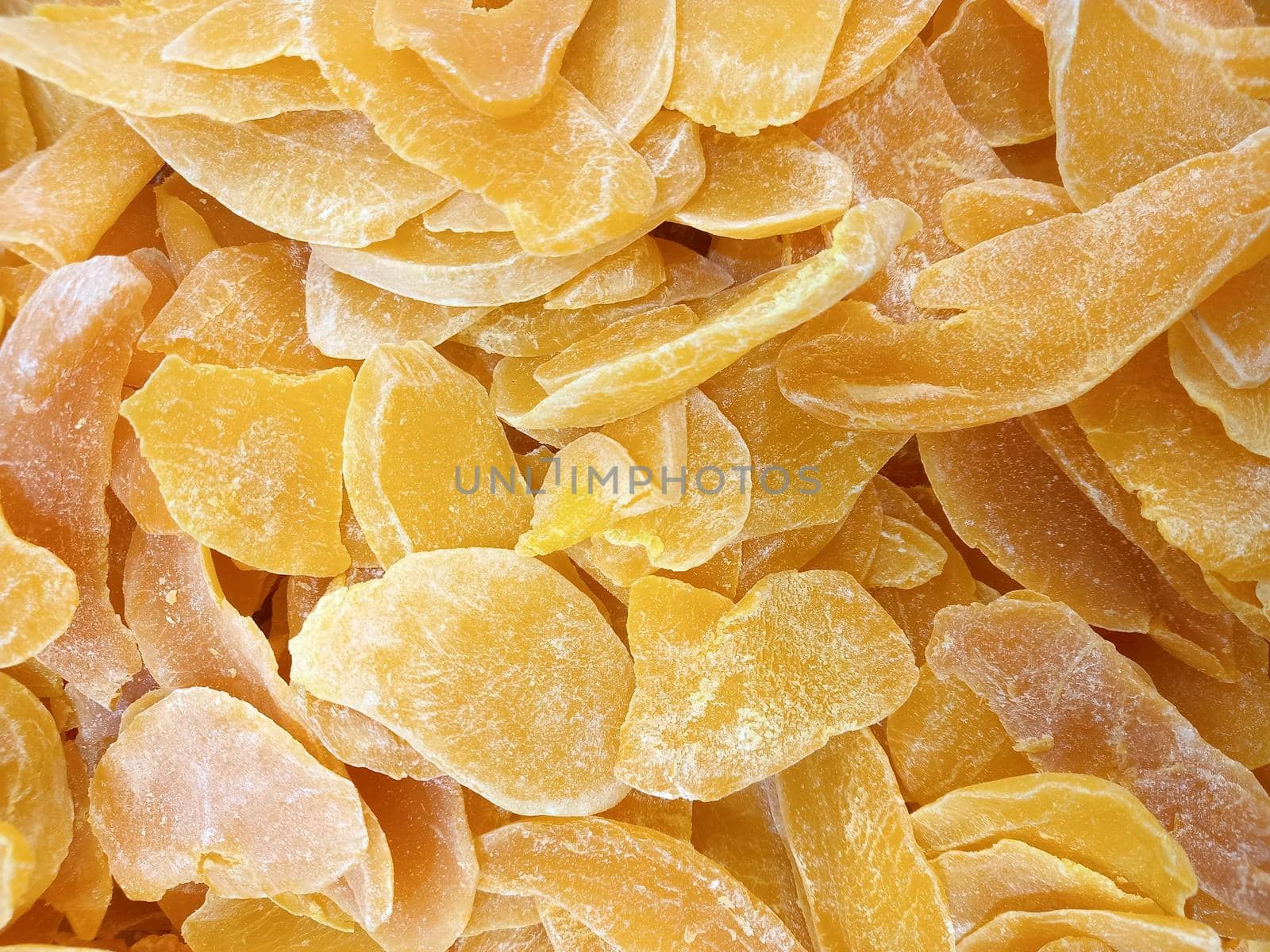 Mango. Dried mango slices, full frame, close-up. High quality photo