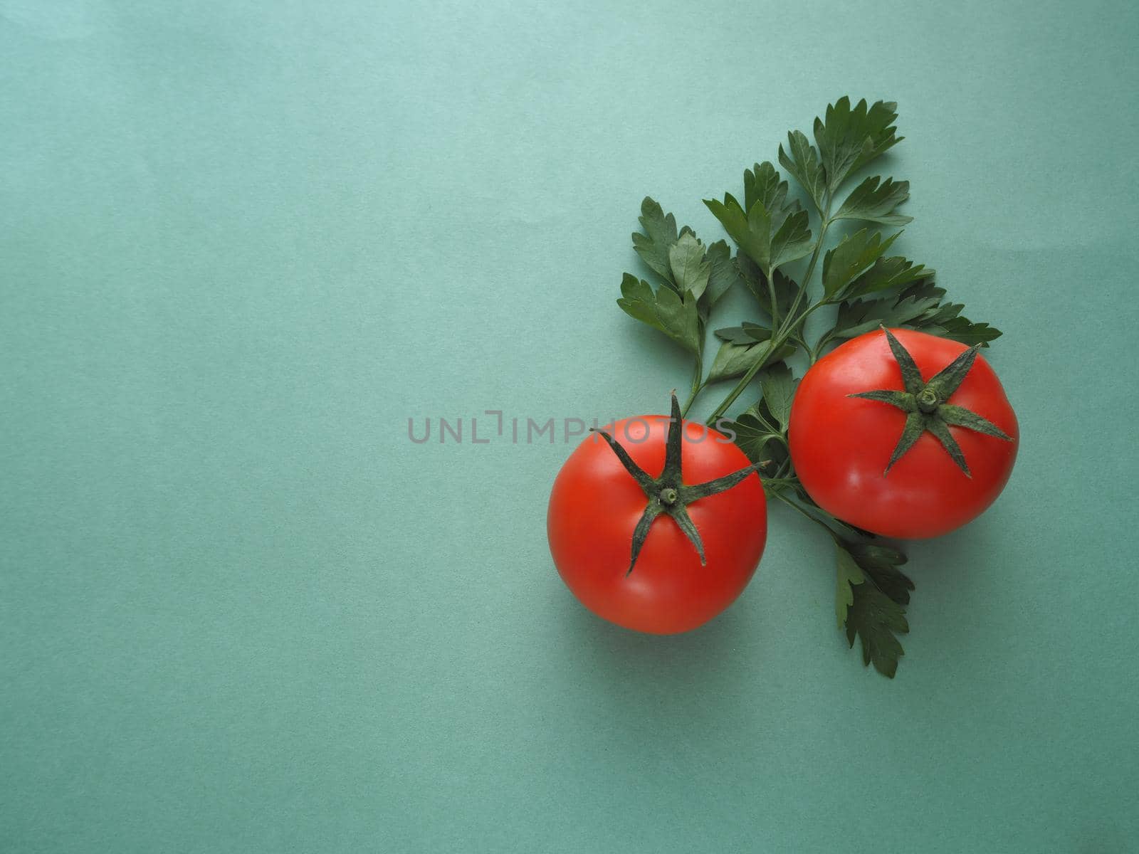 Ripe vegetables. Red tomato close-up. Two tomatoes.