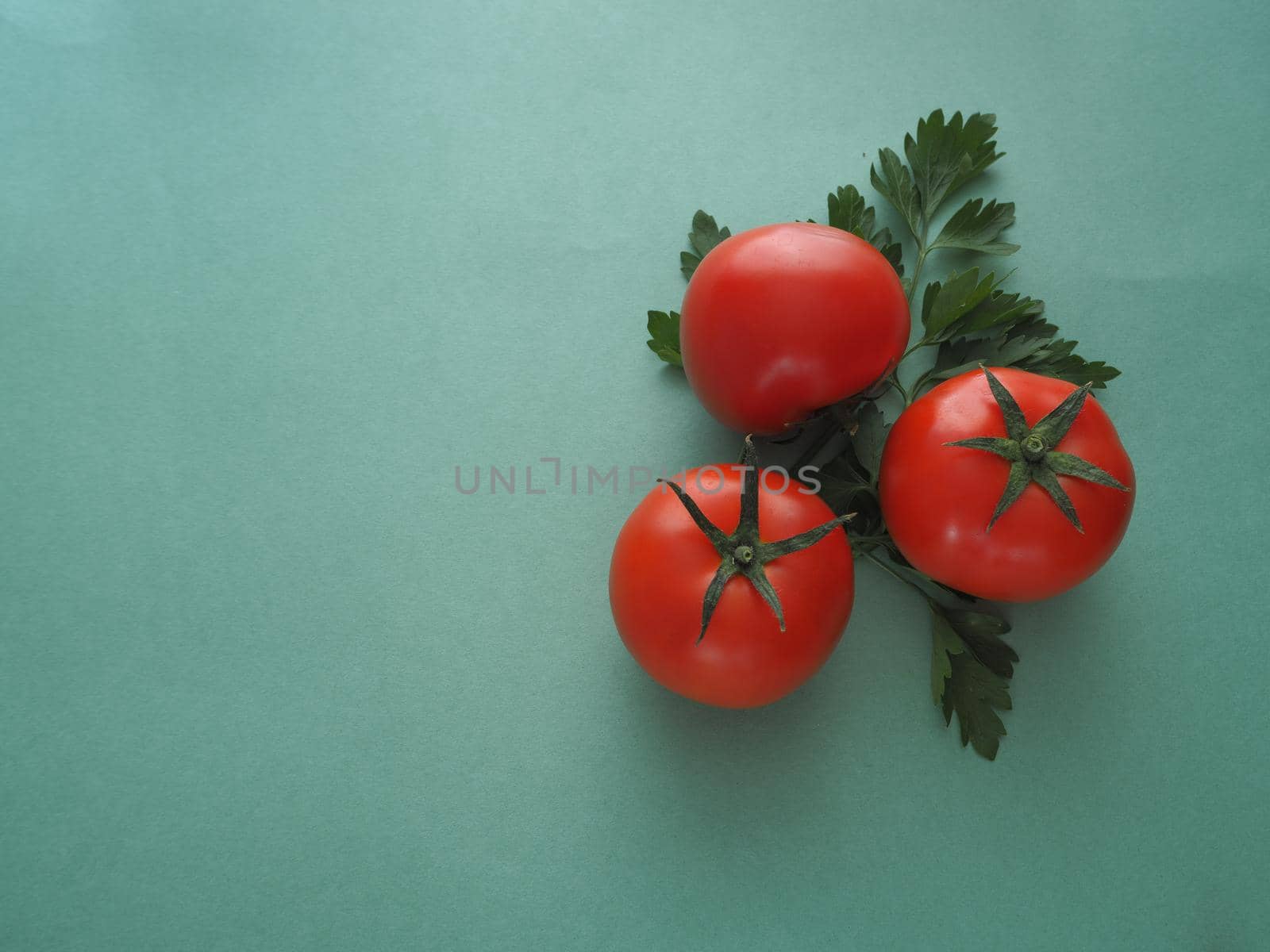 Ripe vegetables. Red tomato close-up. Two tomatoes.