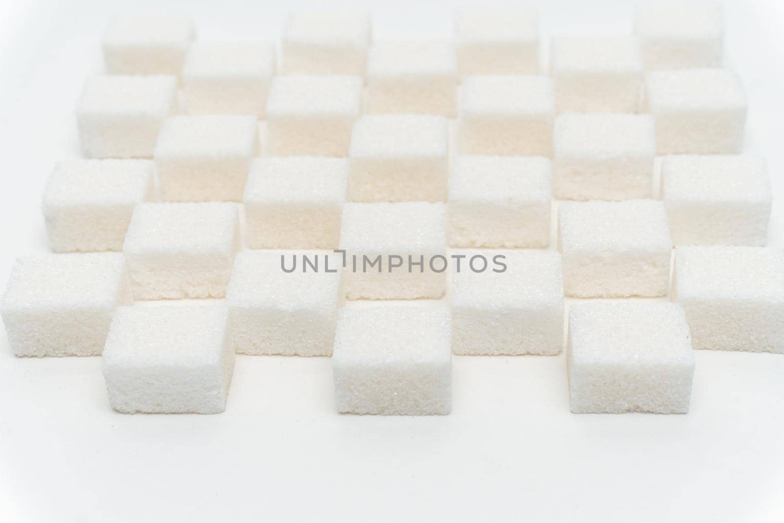 sugar cubes staggered Glucose refined food ingredient. High quality photo