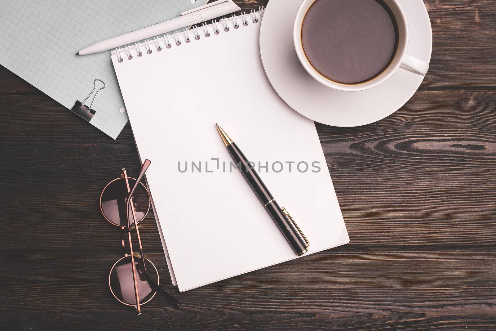 notepad stationery pen clip coffee cup office work business finance. High quality photo