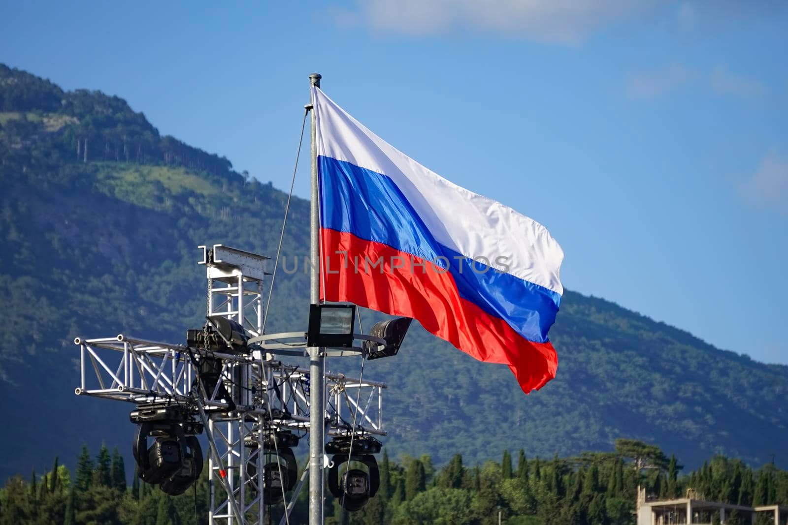 Russian flag on the background of mountains in Yalta, Crimea