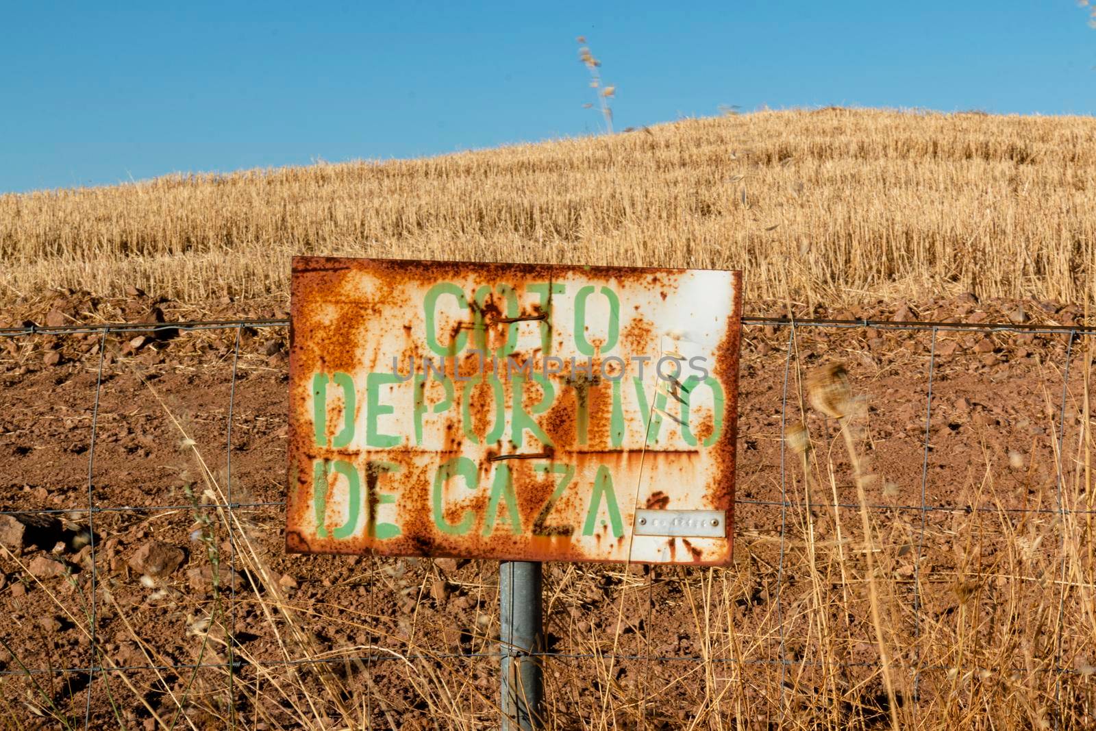 Hunting ground sign at sunset in southern Andalusia, Spain