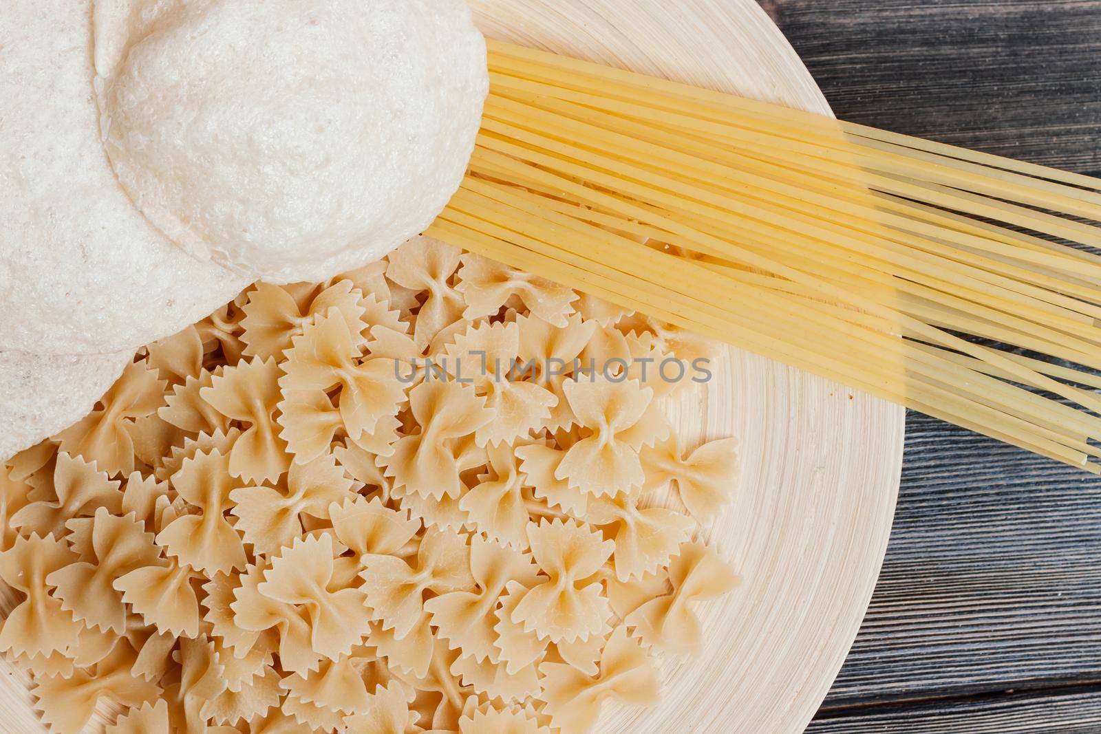 Italian pasta cherry tomatoes ingredients for cooking. High quality photo