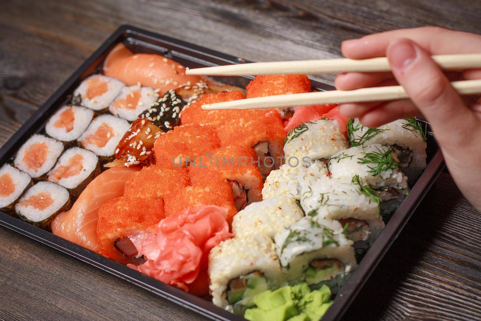 sushi set chopsticks meal japanese food delicacy top view. High quality photo