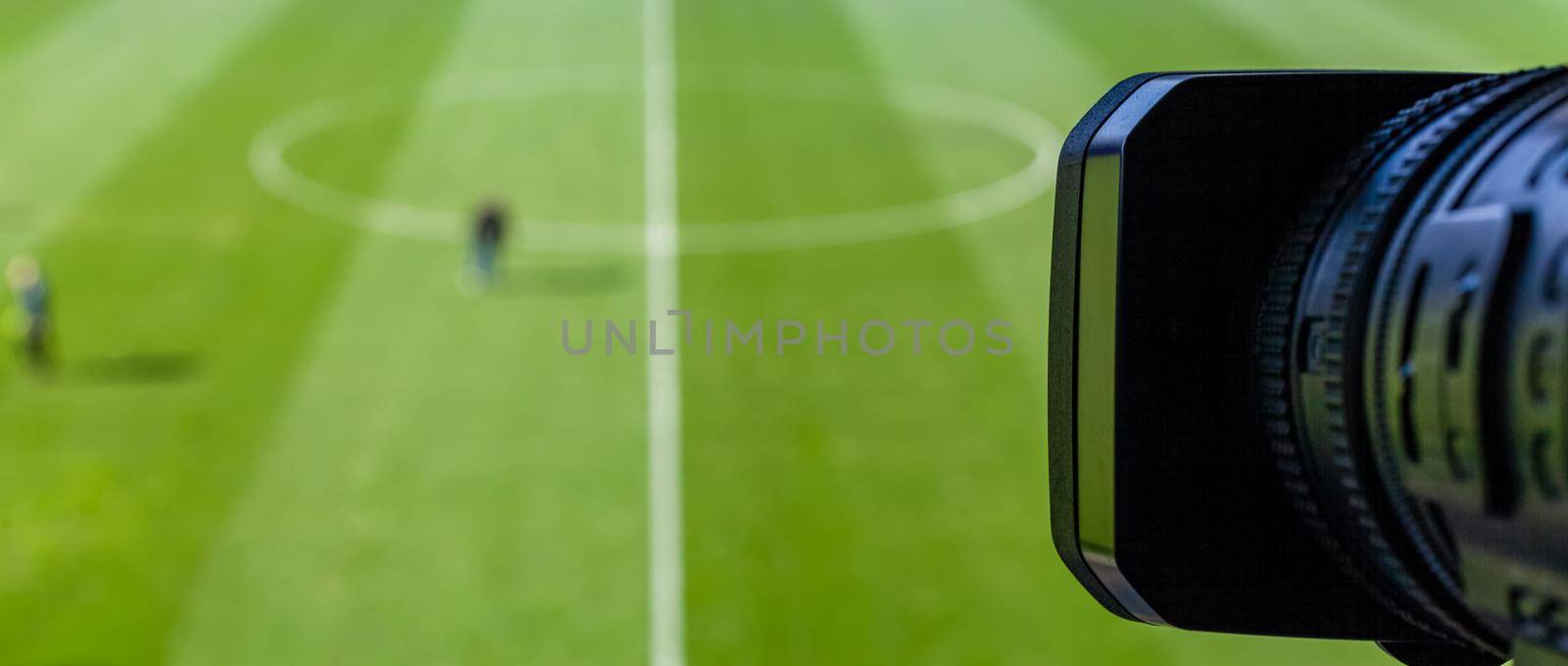camera for live stream at a football stadium by Edophoto