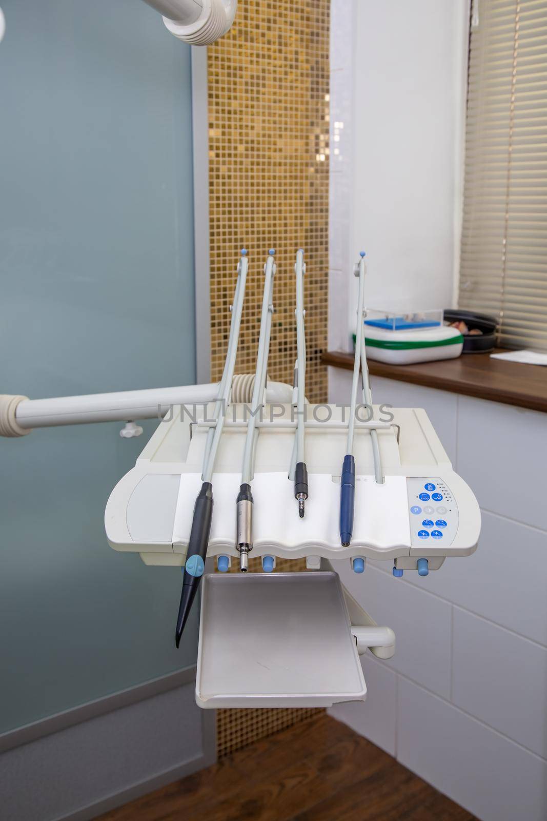 White dental equipment tools for the treatment and filling of teeth in the doctor's office.
