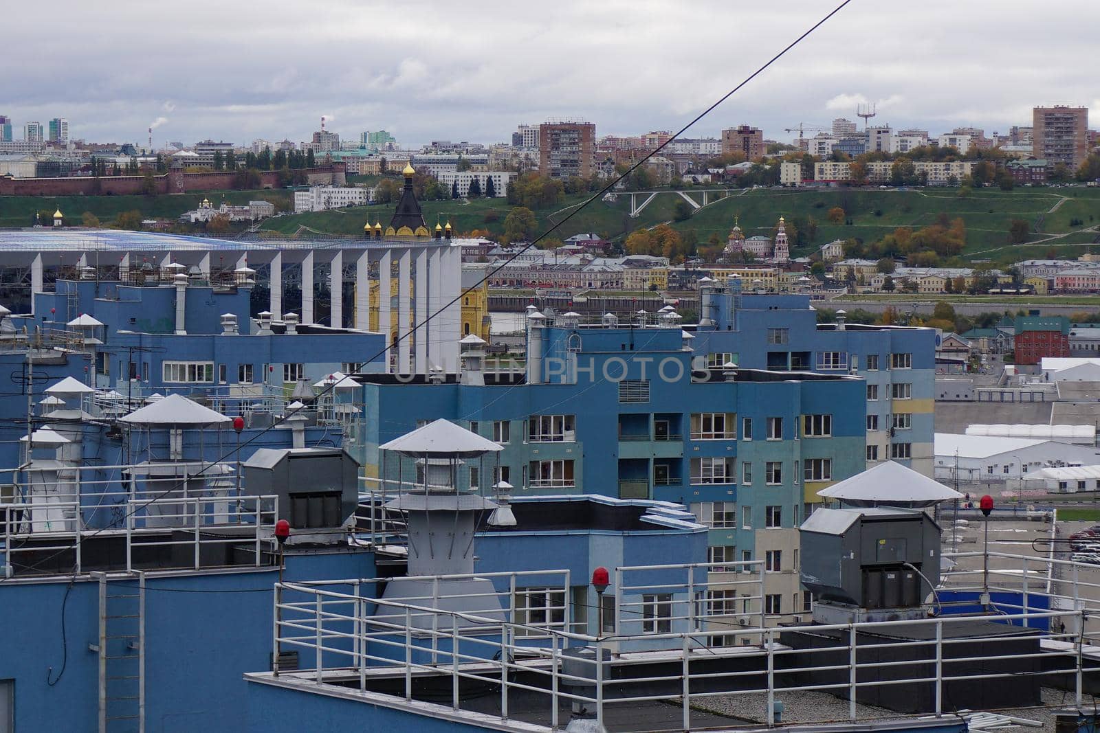 Metropolis. Large apartment buildings in the city by the river.