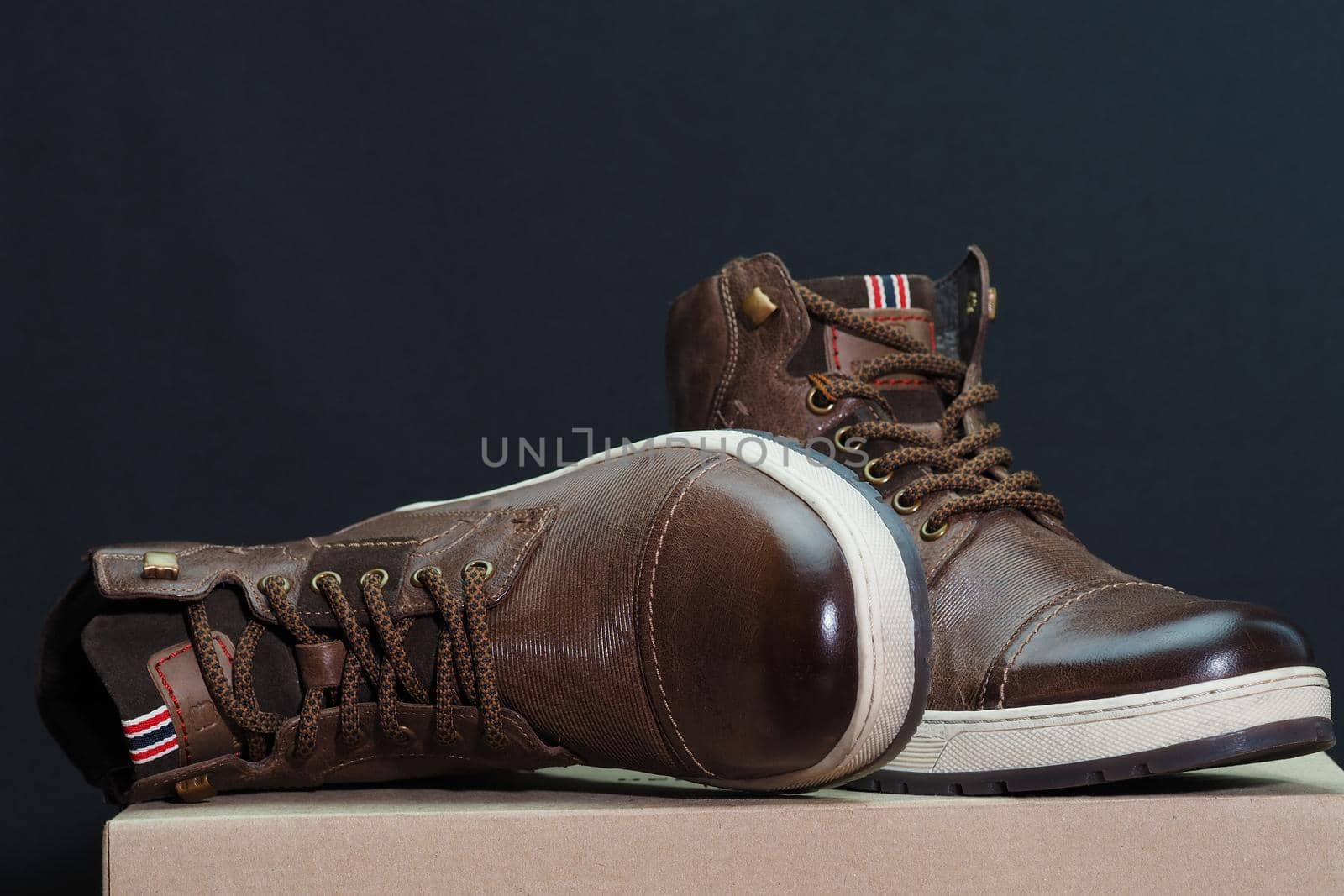 Men's shoes are brown leather. High quality photo