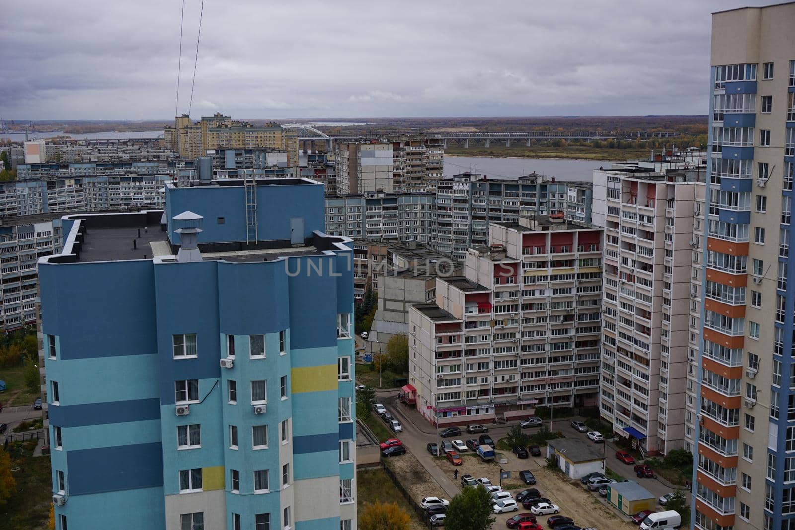 Metropolis. Large apartment buildings in the city by the river.