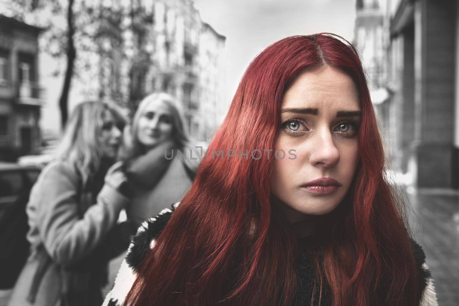 a young depressed student girl with red hair who is bullied by her teenage peers, disturbed by feelings of despair and suffering from oppression. social issues