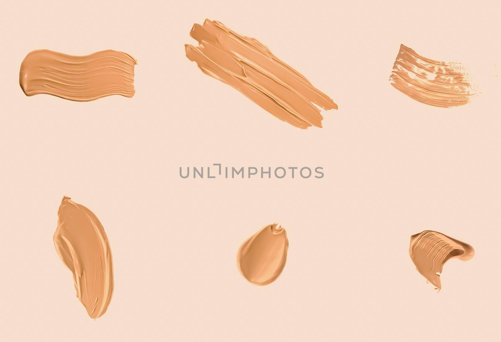 Liquid foundation smudges, smears and strokes as makeup textures isolated on beige background, beauty and cosmetics by Anneleven