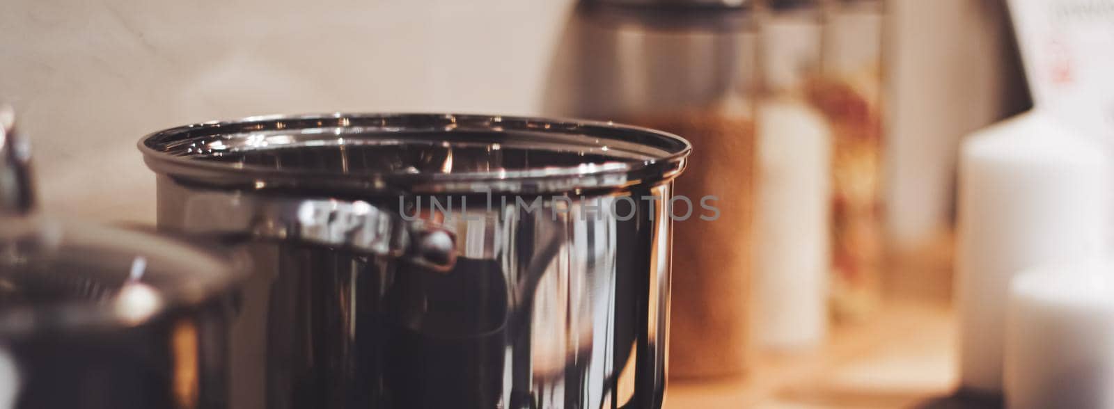 Aluminium pot on a kitchen stove, cookware and cooking by Anneleven