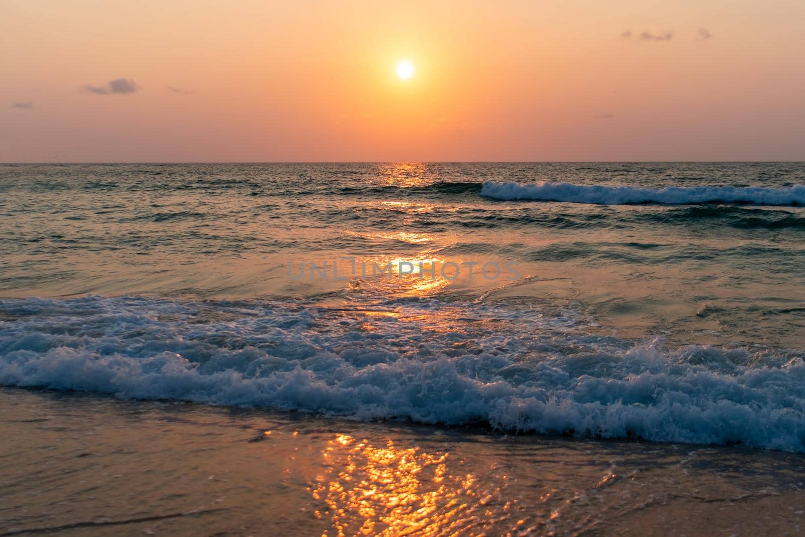 Colorful vibrant ocean sea wave beach summer with sunrise or sunset background landscape on vacation day. 