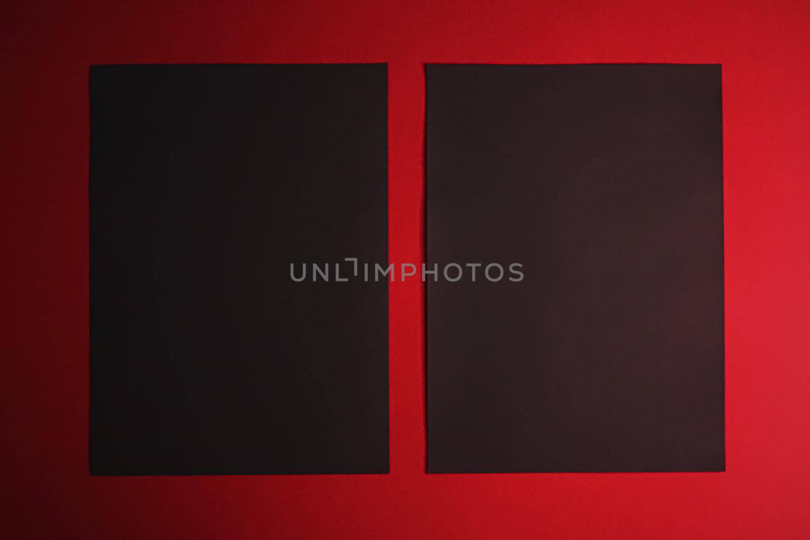 Black A4 papers on red background as office stationery flatlay, luxury branding flat lay and brand identity design for mockups