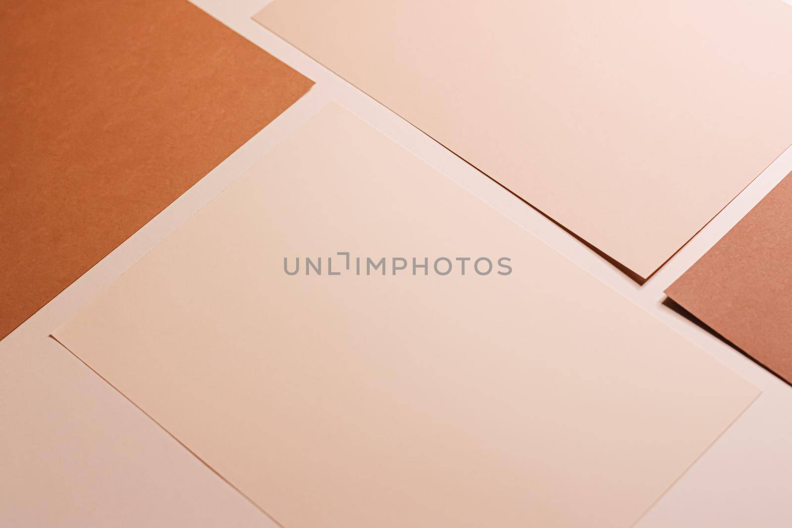 Beige and brown A4 papers as office stationery flatlay, luxury branding flat lay and brand identity design for mockup by Anneleven