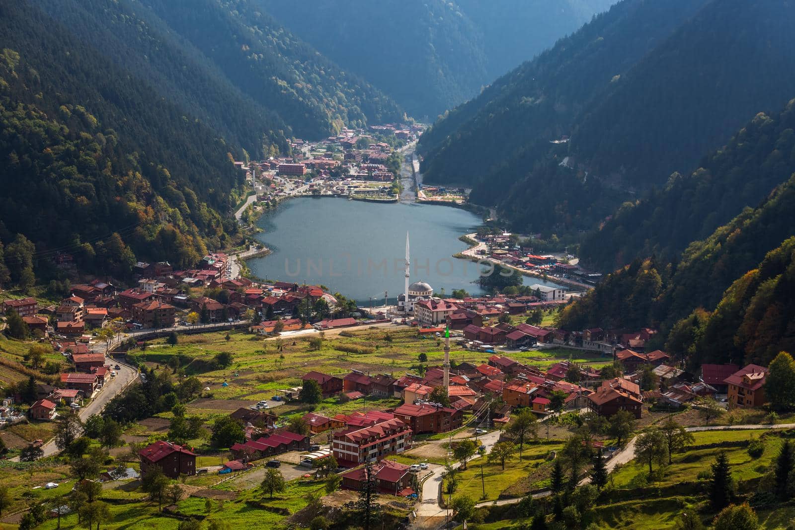 View of the mosque on the shore of the mountain lake Uzungol, Trabzon, Turkey.