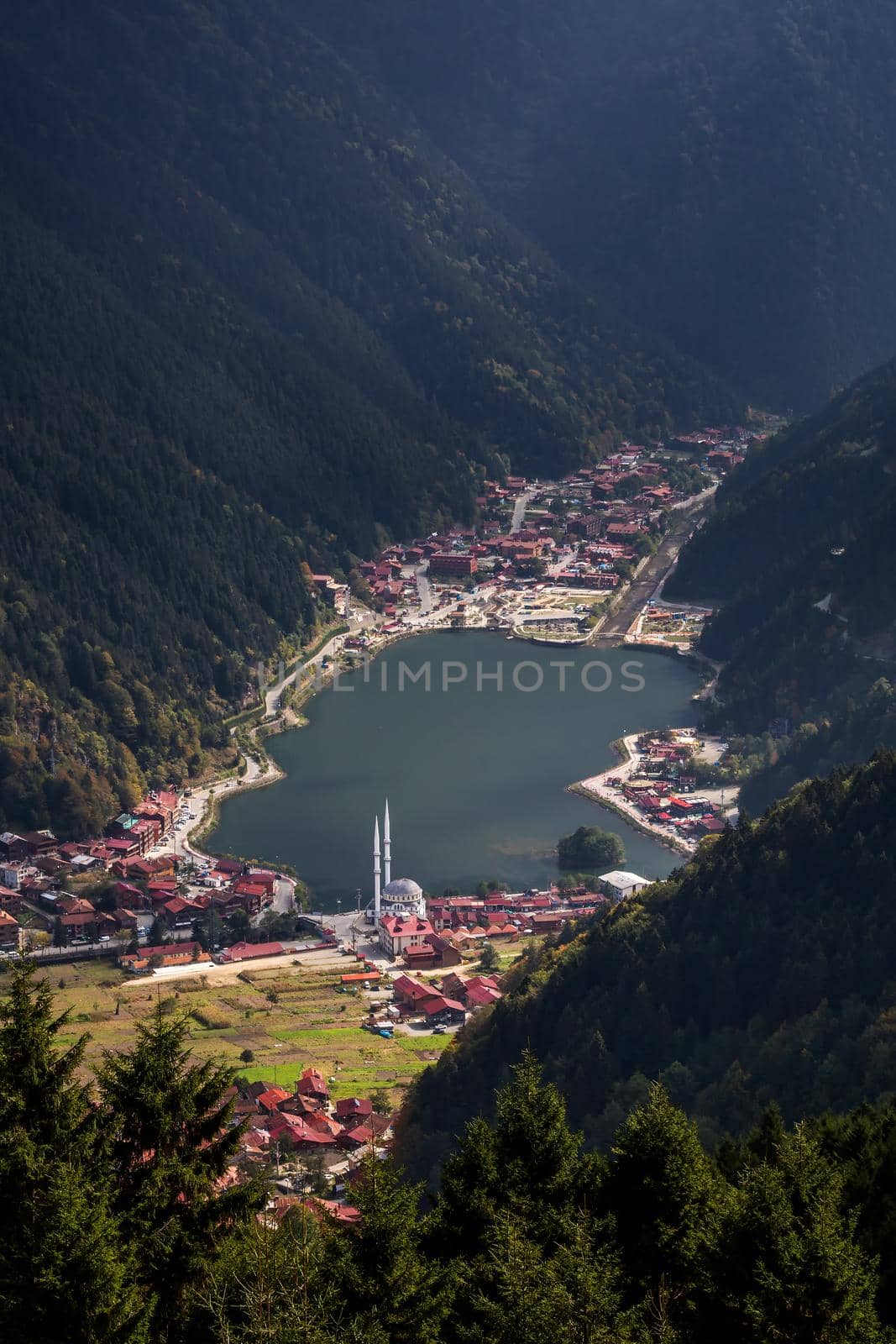 View of the mosque on the shore of the mountain lake Uzungol, Trabzon, Turkey.