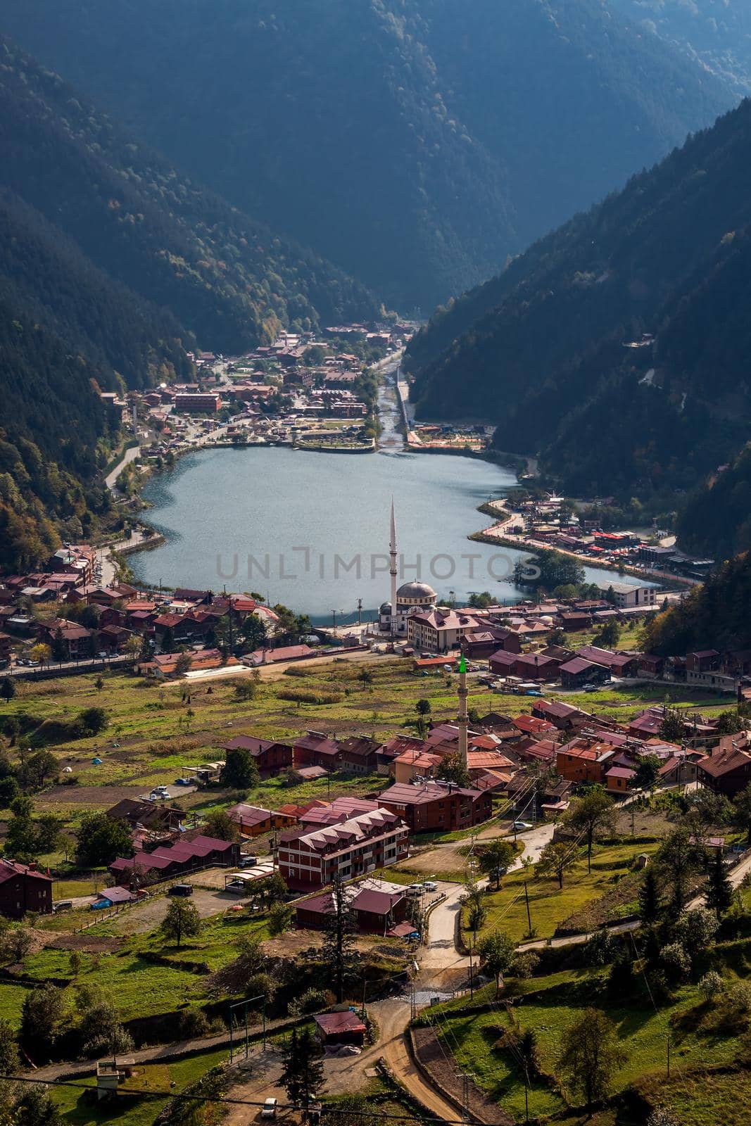 View of the mosque on the shore of the mountain lake Uzungol, Trabzon, Turkey.