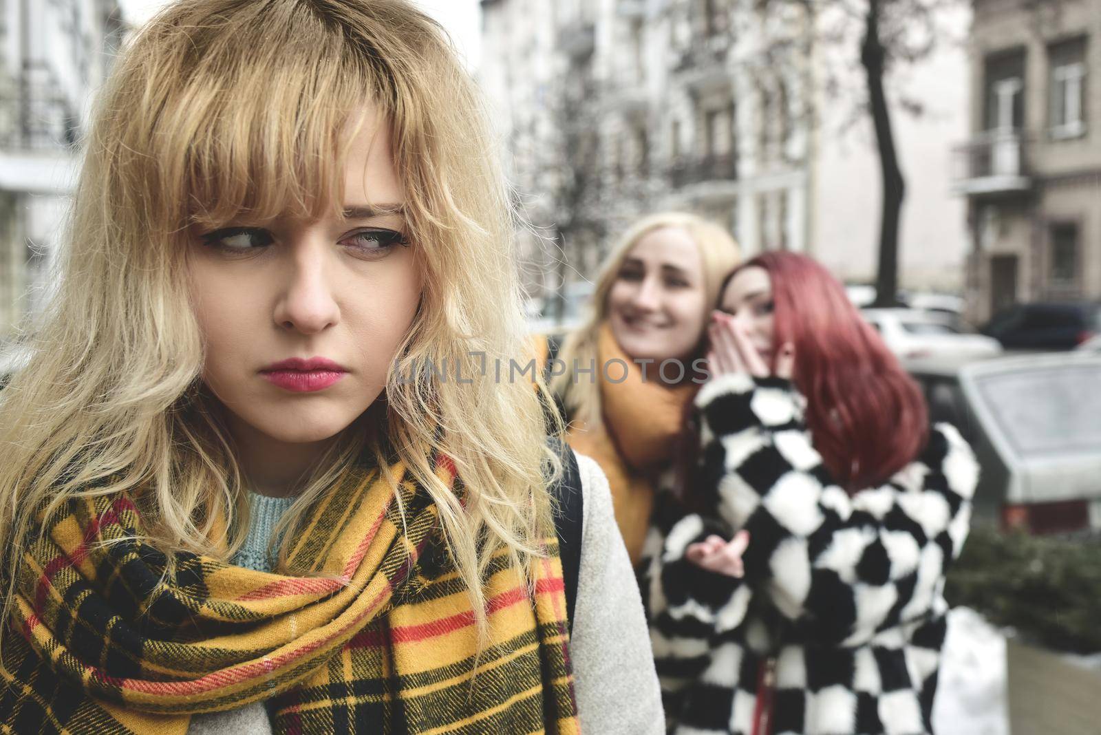 a young depressed student girl with blonde hair who is bullied by her teenage peers, disturbed by feelings of despair and suffering from oppression. social problems