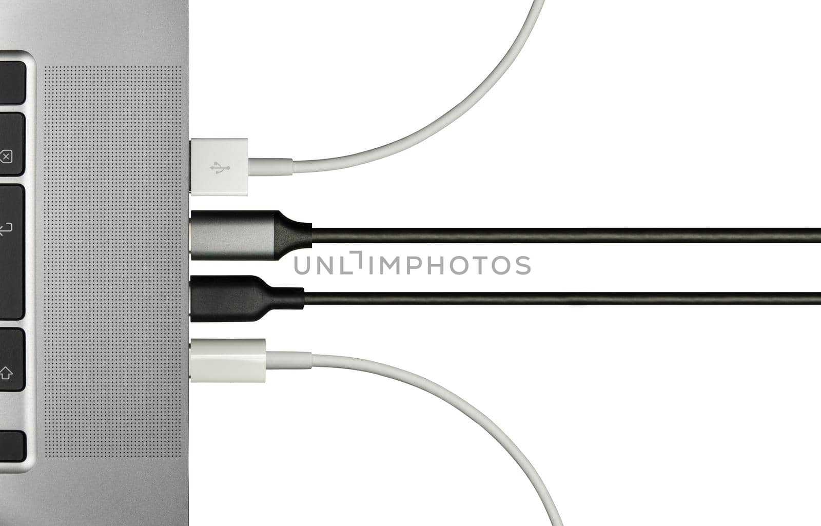 Various Cables Plugged In To A Laptop Computer For Various Peripheral Devices, Isolated On A White Background With Copy Space