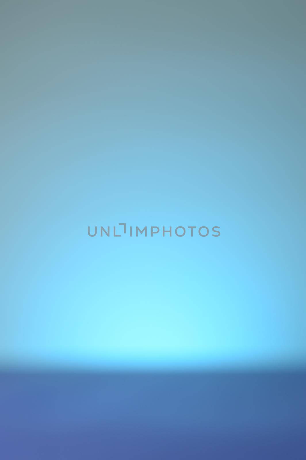 An abstract blue blurred background for use in design work or page layouts.