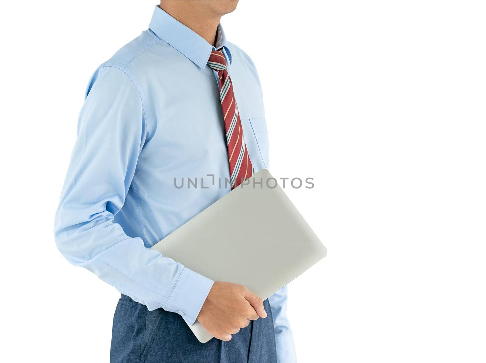 Businessman holding a laptop with clipping path by stoonn