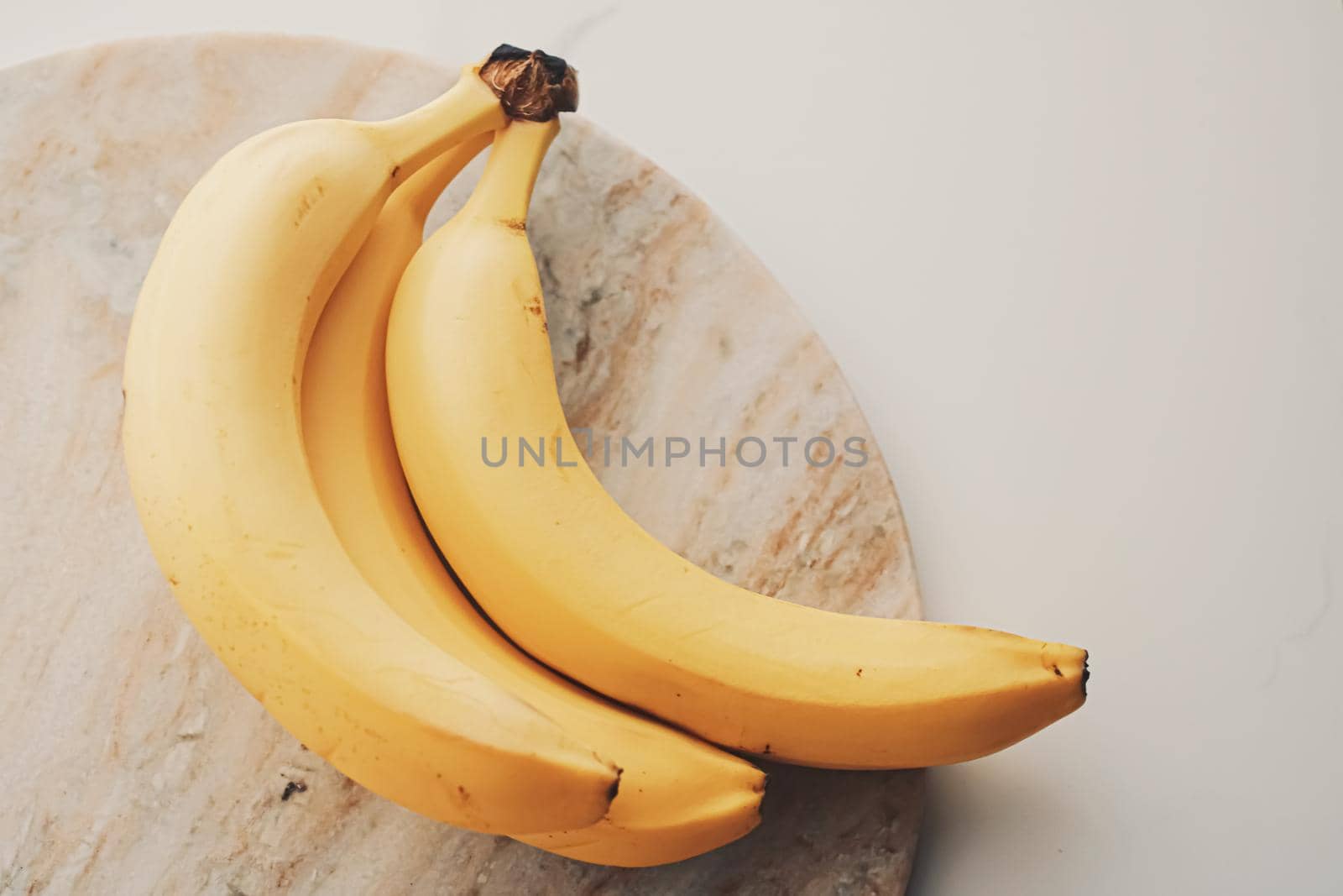 Fresh ripe bananas as healthy food, organic fruits and diet concept