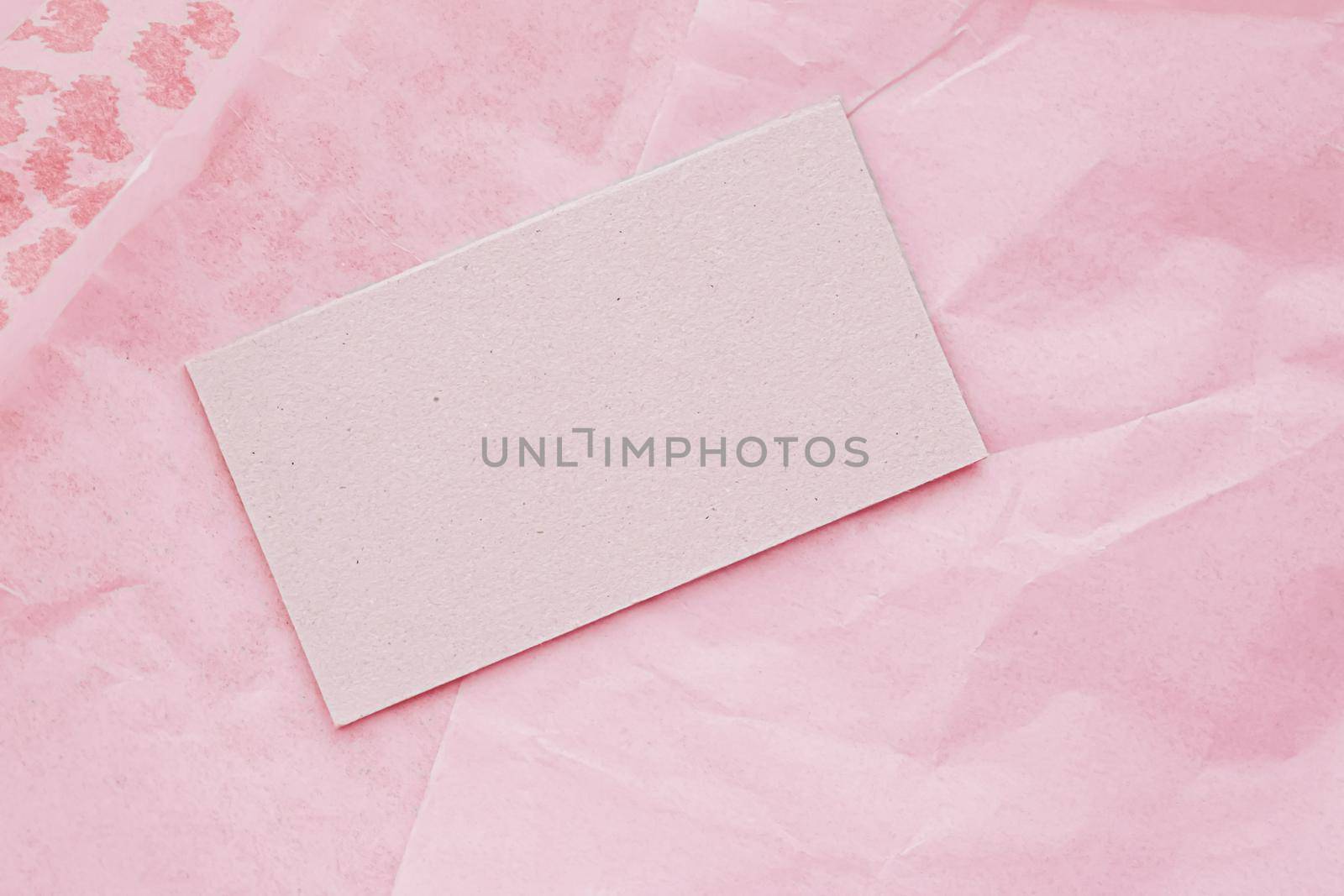 Business card flatlay on pink tissue paper background, luxury branding flat lay and brand identity design for mockups