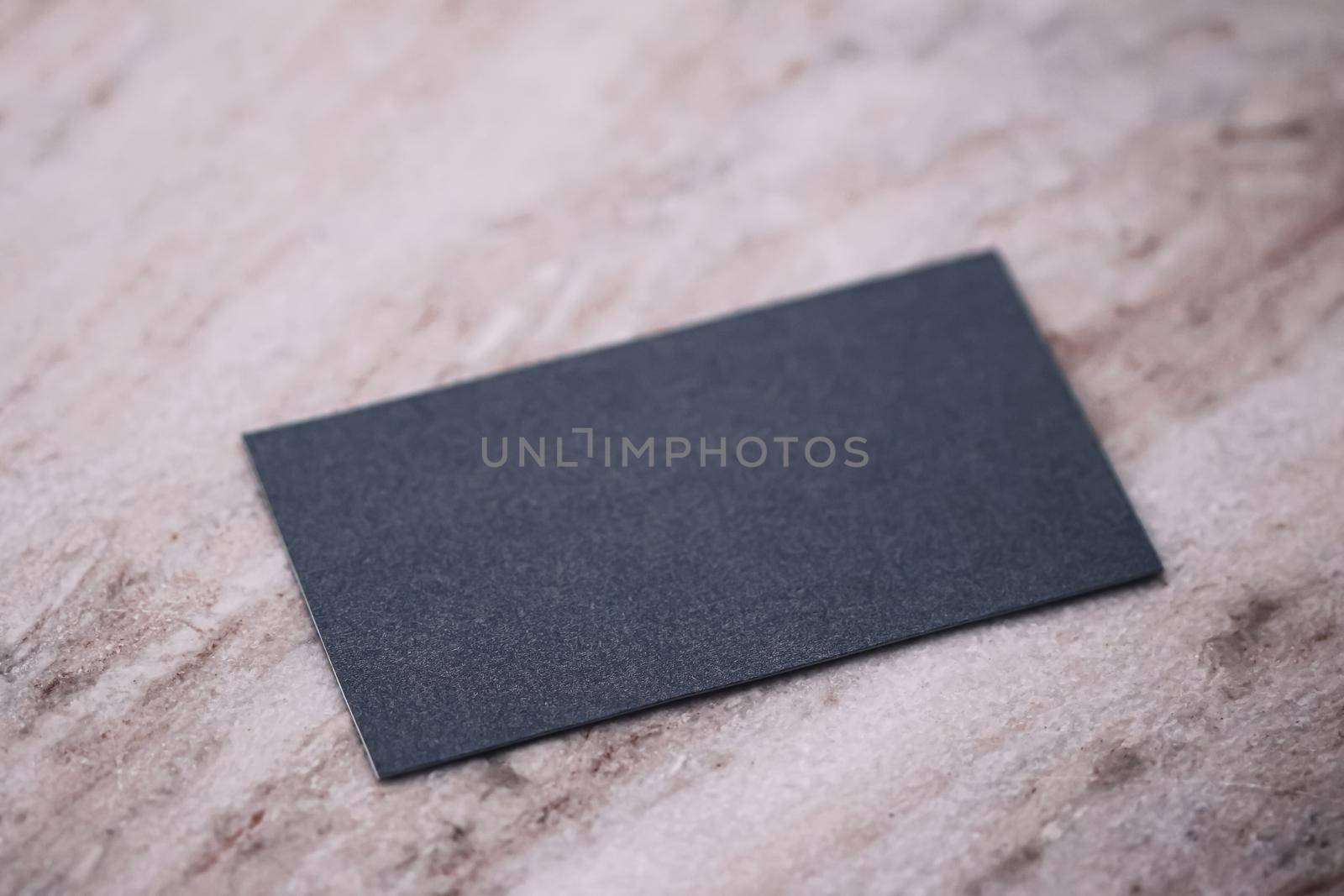 Black business card flatlay on stone background, luxury branding flat lay and brand identity design for mockup by Anneleven