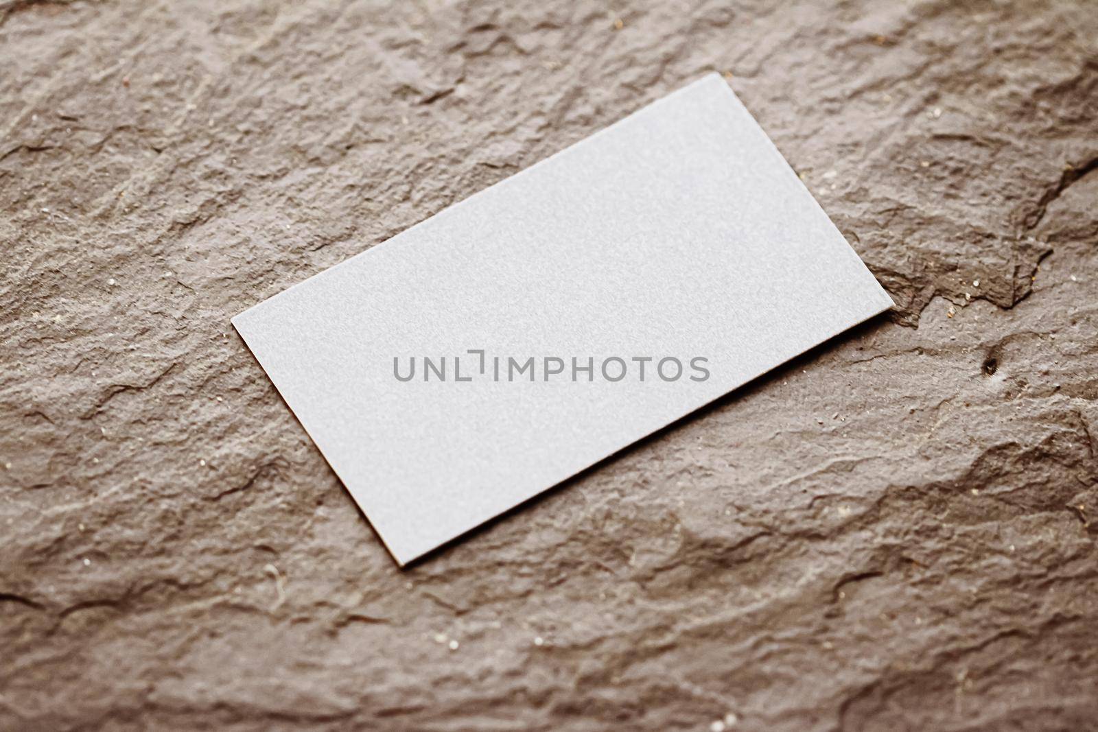 White business card flatlay on brown stone background, luxury branding flat lay and brand identity design for mockup by Anneleven