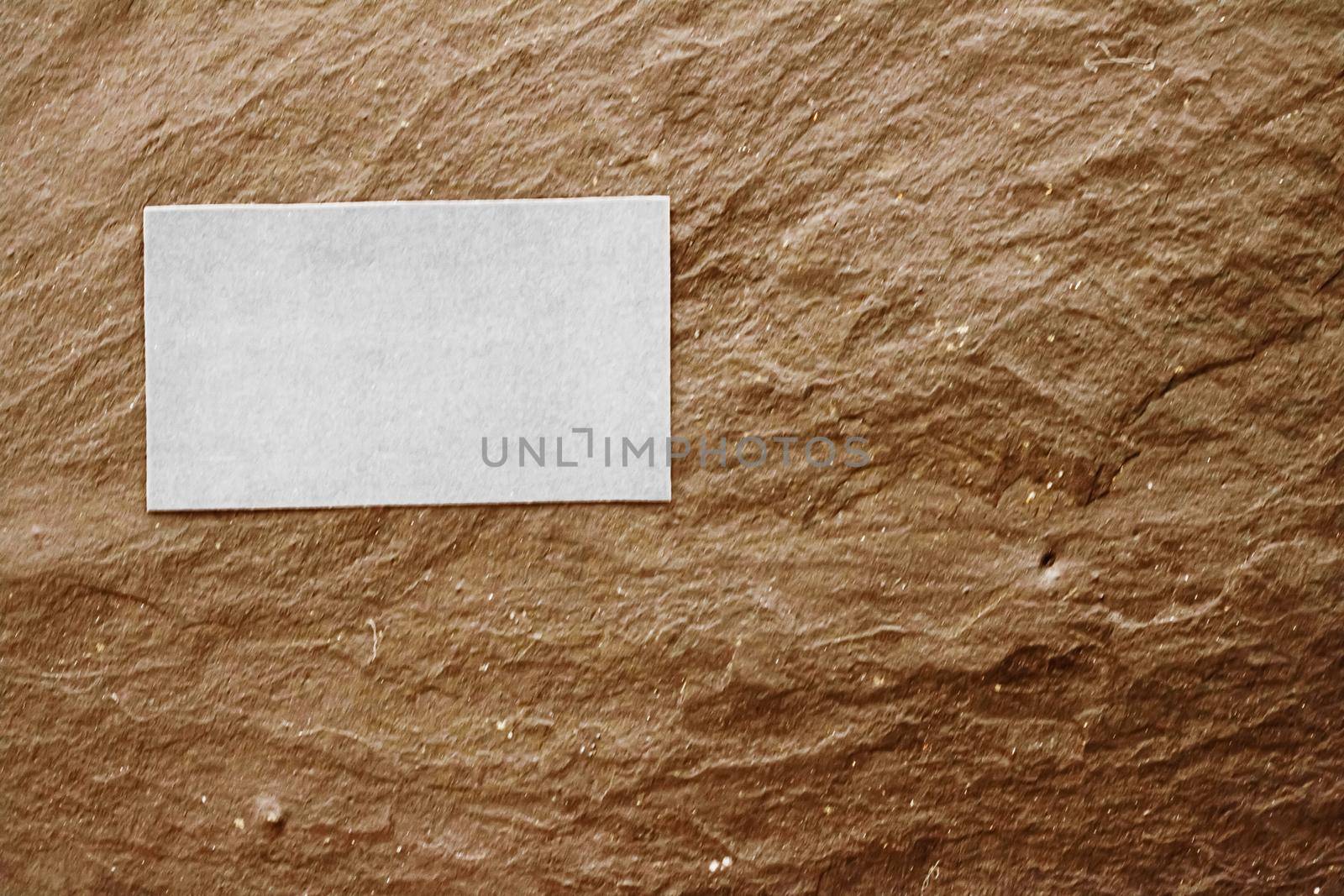 White business card flatlay on brown stone background, luxury branding flat lay and brand identity design for mockups
