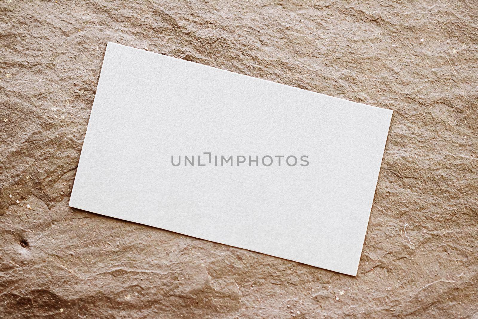 White business card flatlay on brown stone background, luxury branding flat lay and brand identity design for mockup by Anneleven