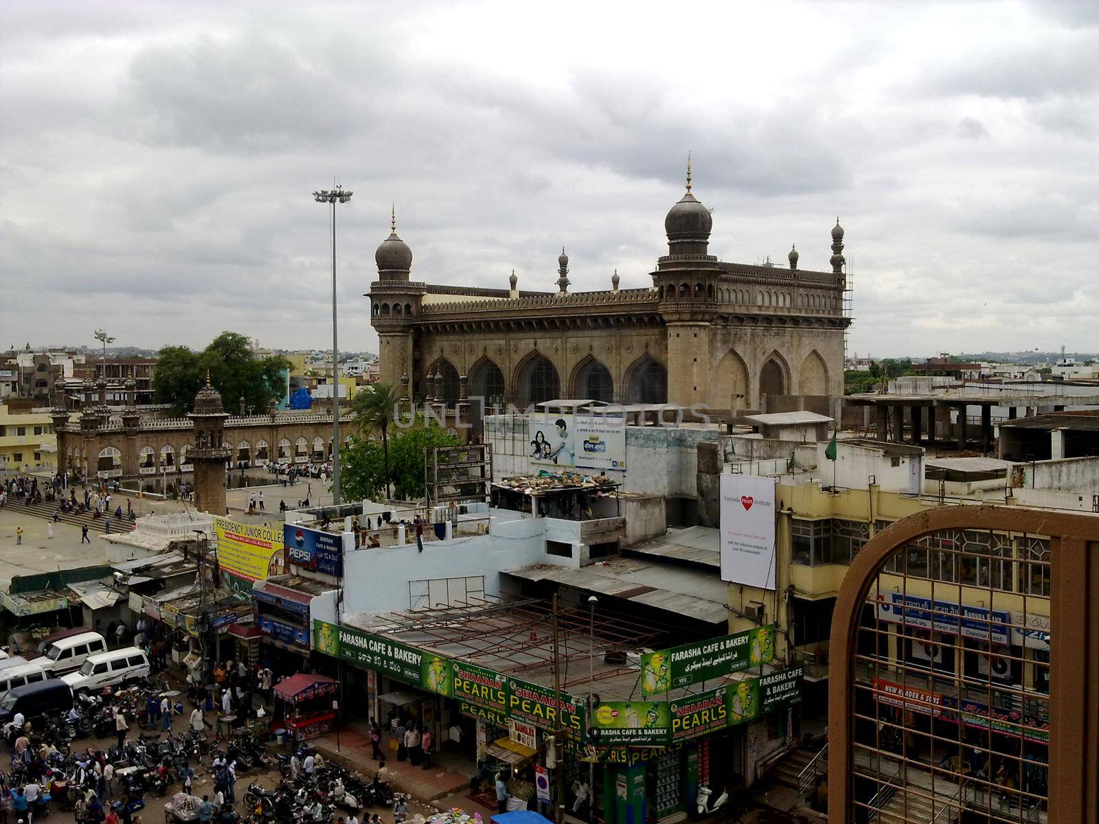 Hydrabad, India - July 1, 2015: View of the Makkah masjid mosque from Charminar in Hyderabad. by tabishere