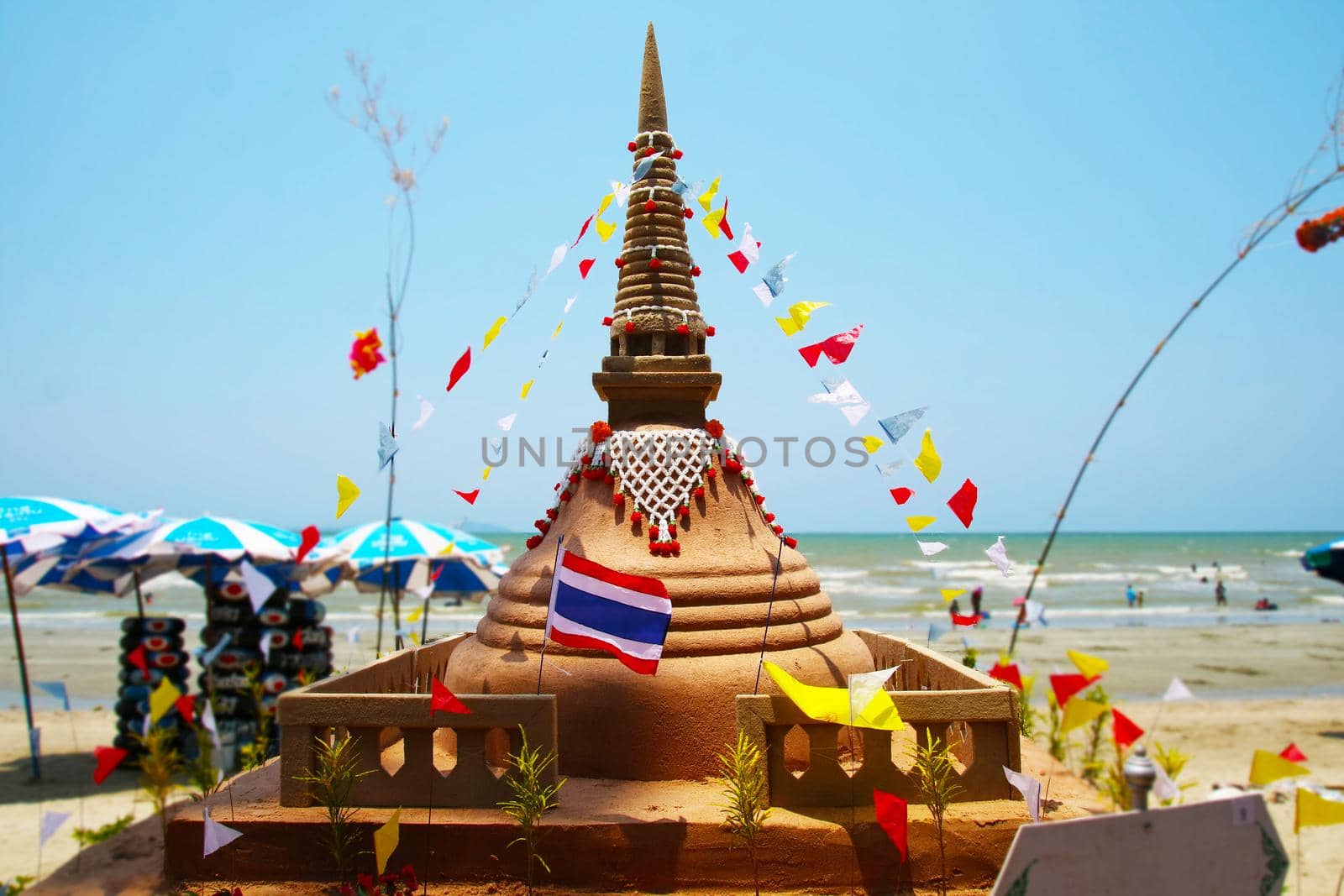 small sand pagoda in Songkran festival represents In order to take the sand scraps attached to the feet from the temple to return the temple in the shape of a sand pagoda