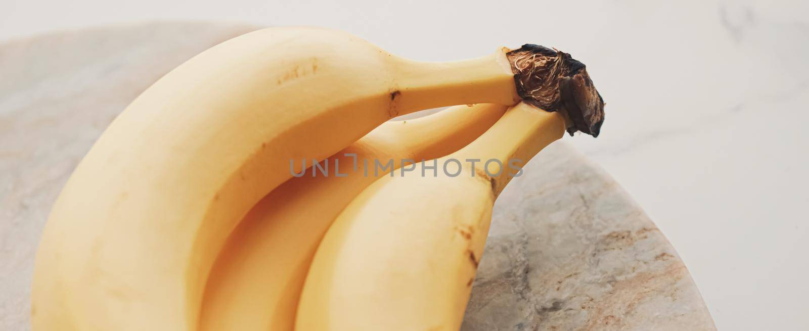 Fresh ripe bananas as healthy food, organic fruits and diet concept