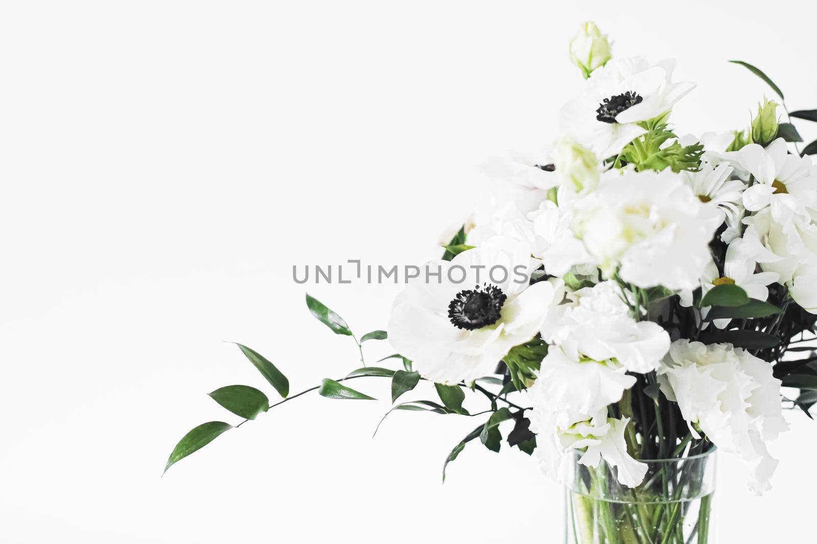 Bouquet of flowers in vase and home decor details, luxury interior design by Anneleven