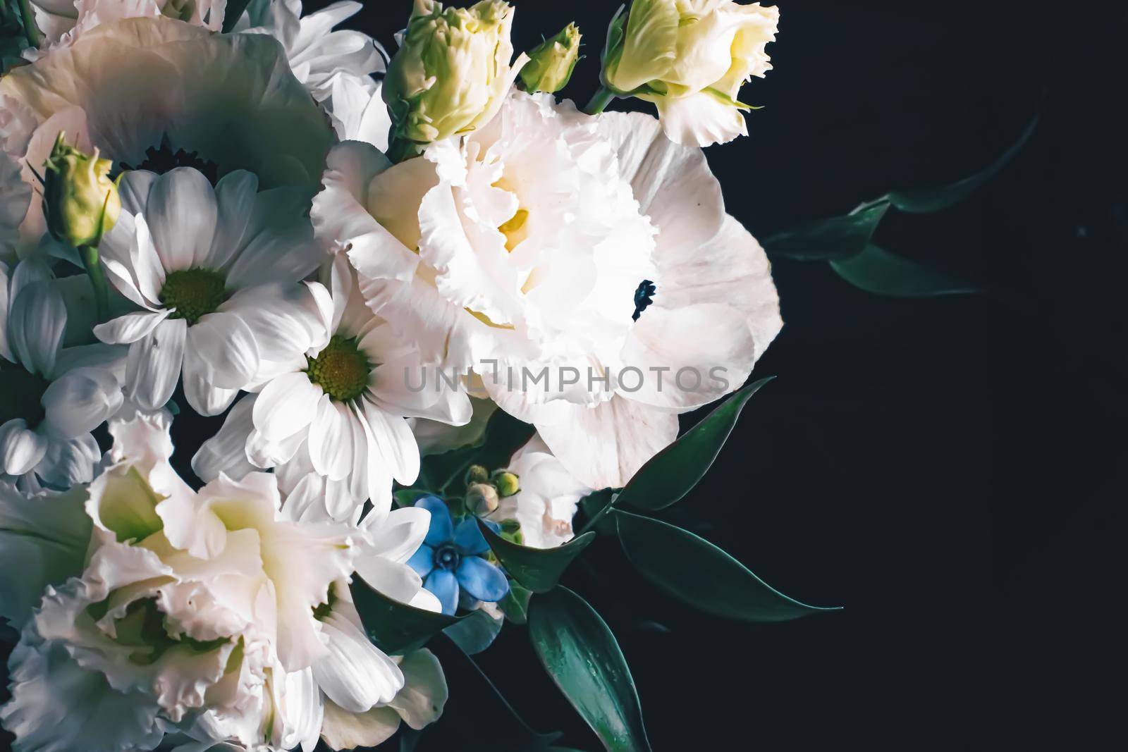 Flower bouquet on black background, beautiful floral arrangement, creative flowers and floristic design ideas