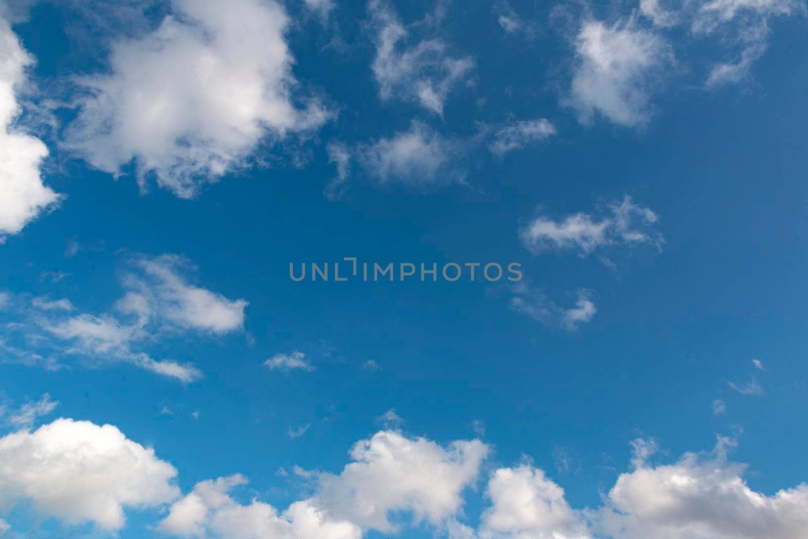 Cloudy sky with a nice blue background by loopneo