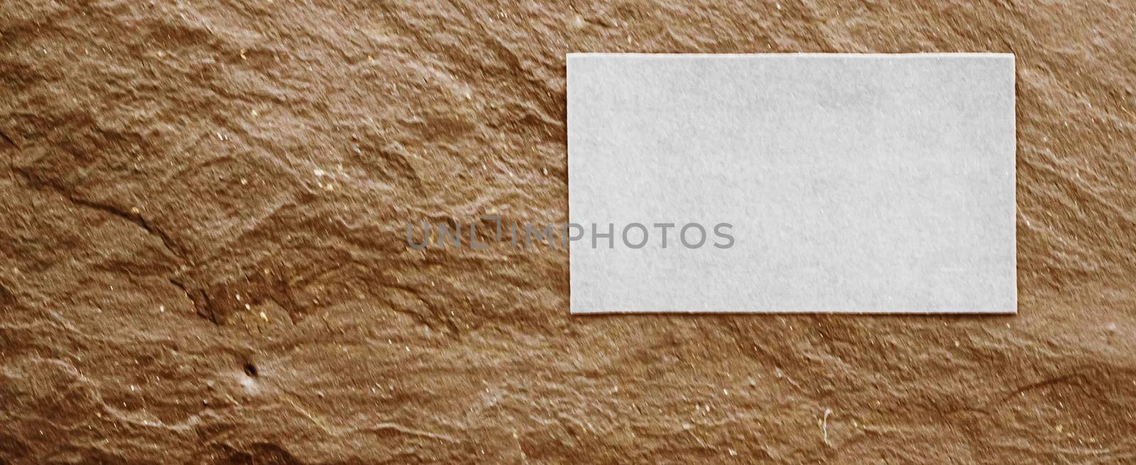 White business card flatlay on brown stone background, luxury branding flat lay and brand identity design for mockup by Anneleven
