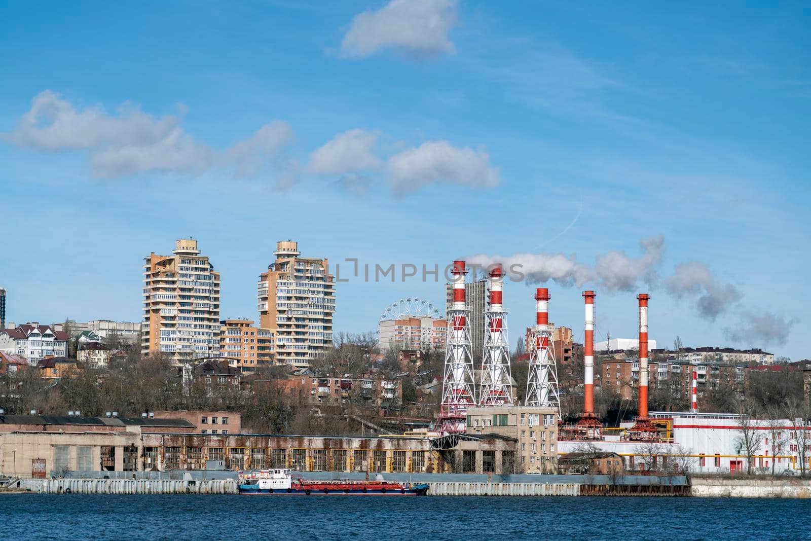 smoking chimneys on the background of the city. High quality photo