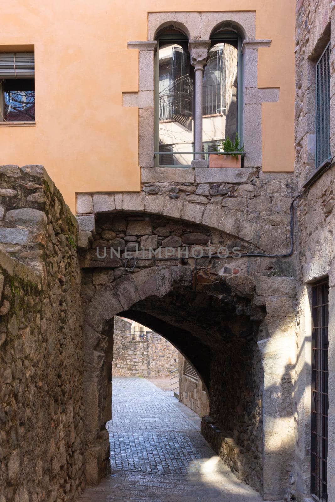 Stone arch in a house in the City of Girona in Catalonia, Spain