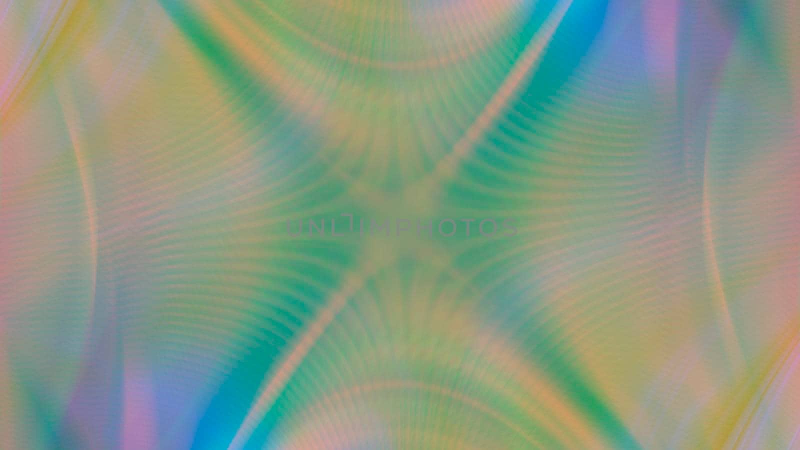 Abstract blurry green background with rainbow glow.