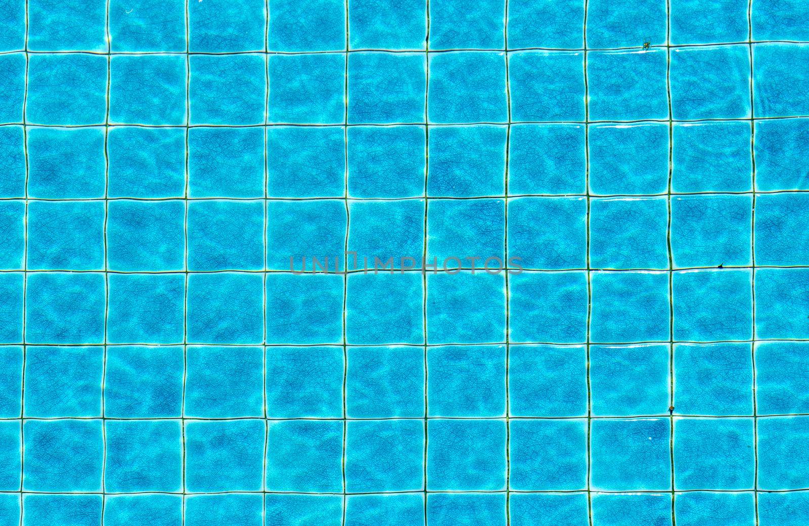 Top view swimming pool blue ripped water abstract background by kaisorn