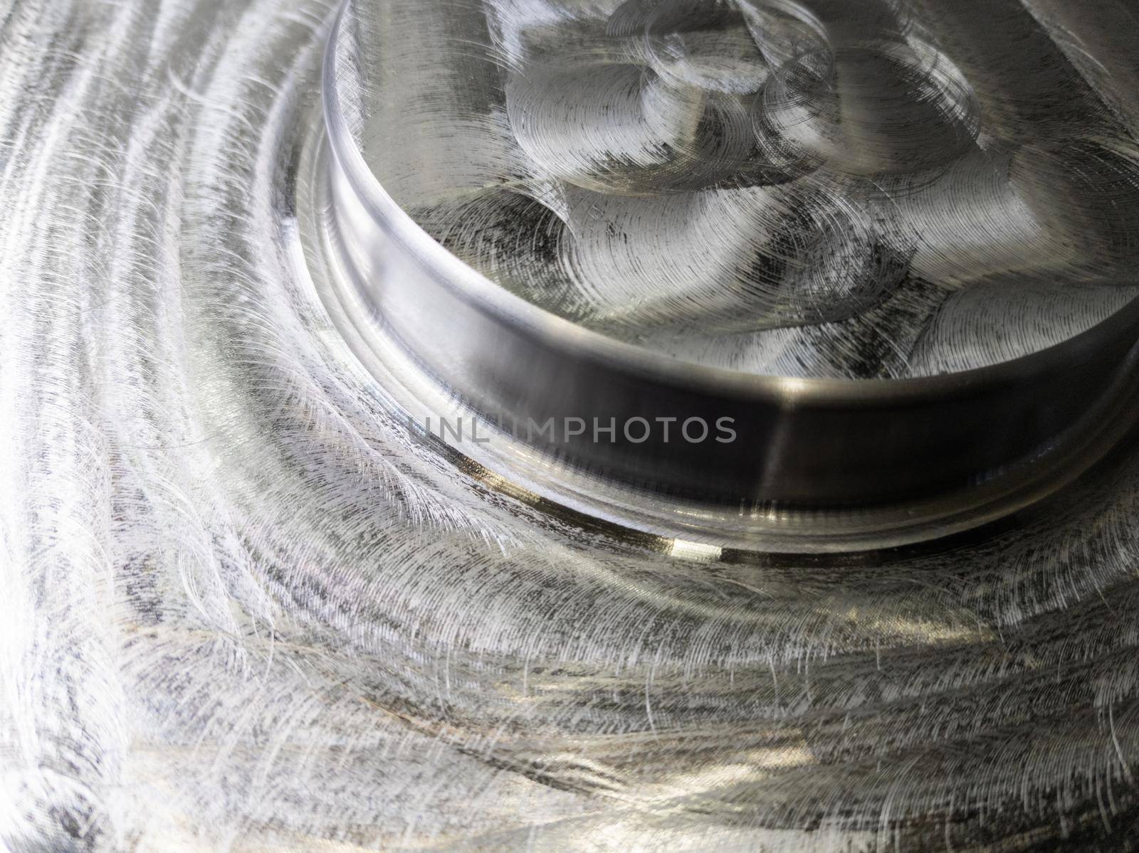 round steel workpiece after cnc surface milling - full frame industrial cnc technology backdrop.