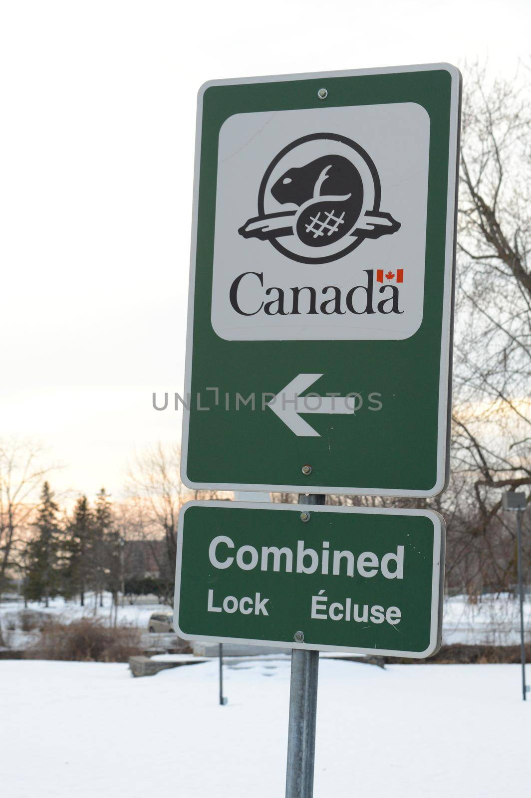 SMITHS FALLS, ONTARIO, CANADA, MARCH 10, 2021: A government of Canada signage for the combined lock ahead located at the heart of the Rideau Canal in Smiths Falls, Ontario.