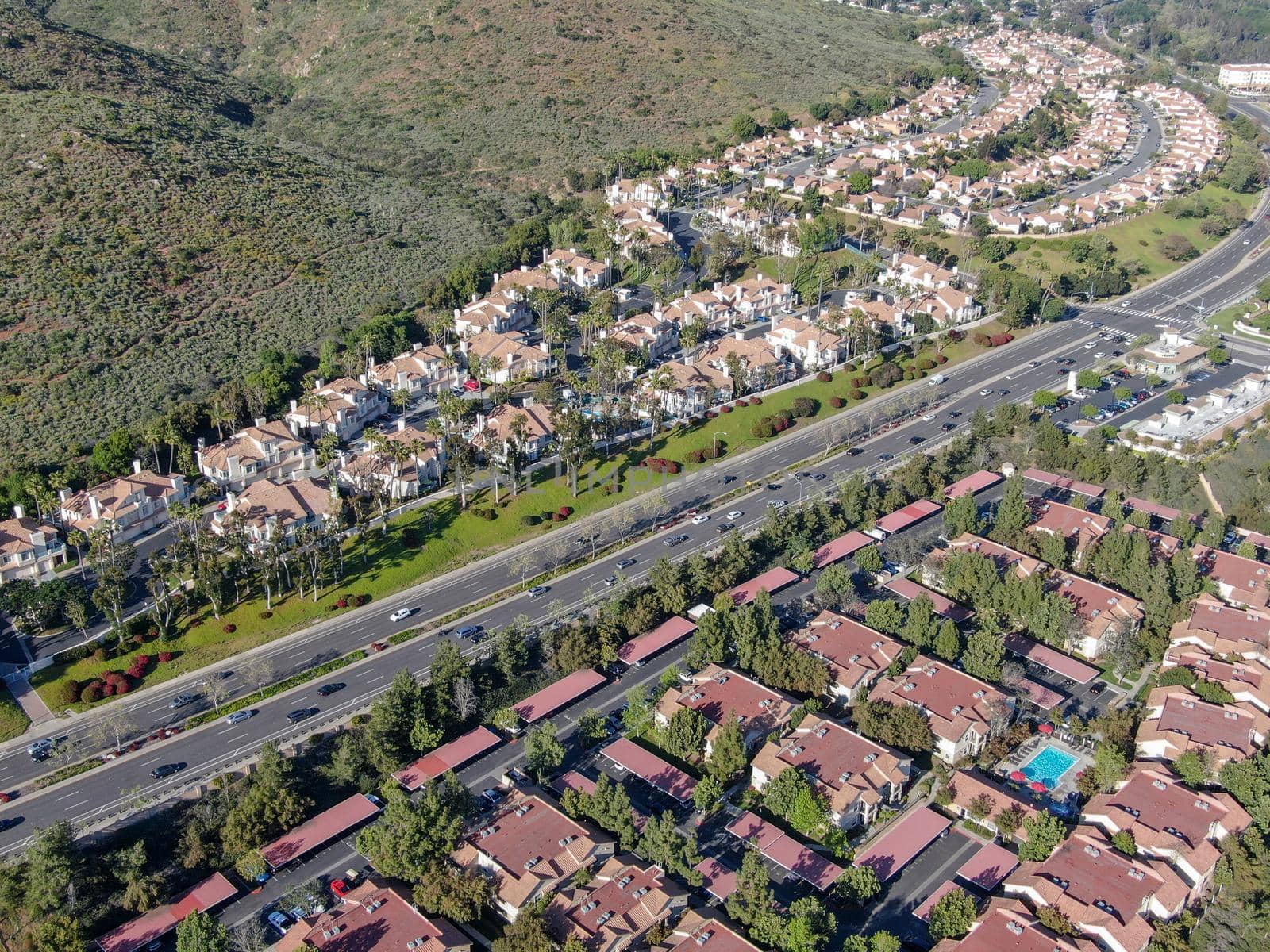 Aerial view of upper middle class neighborhood with big villas around in San Diego by Bonandbon
