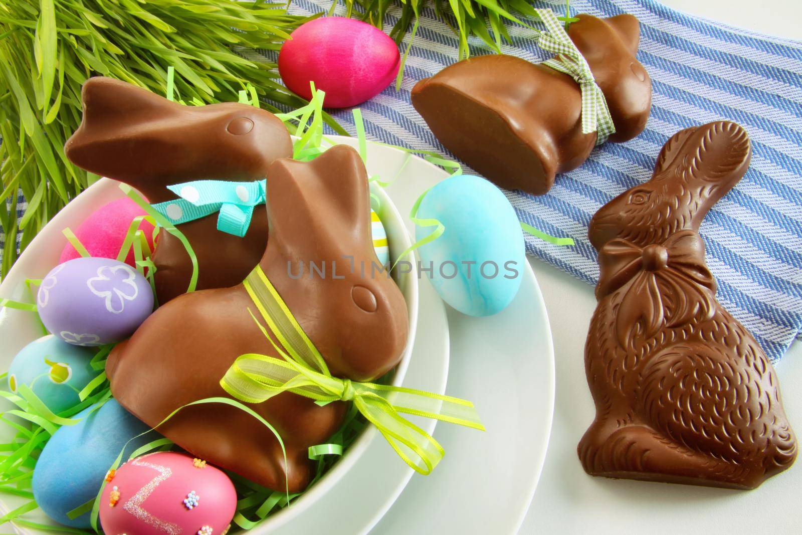 Chocolate Easter bunny and eggs on kitchen counter by Sandralise